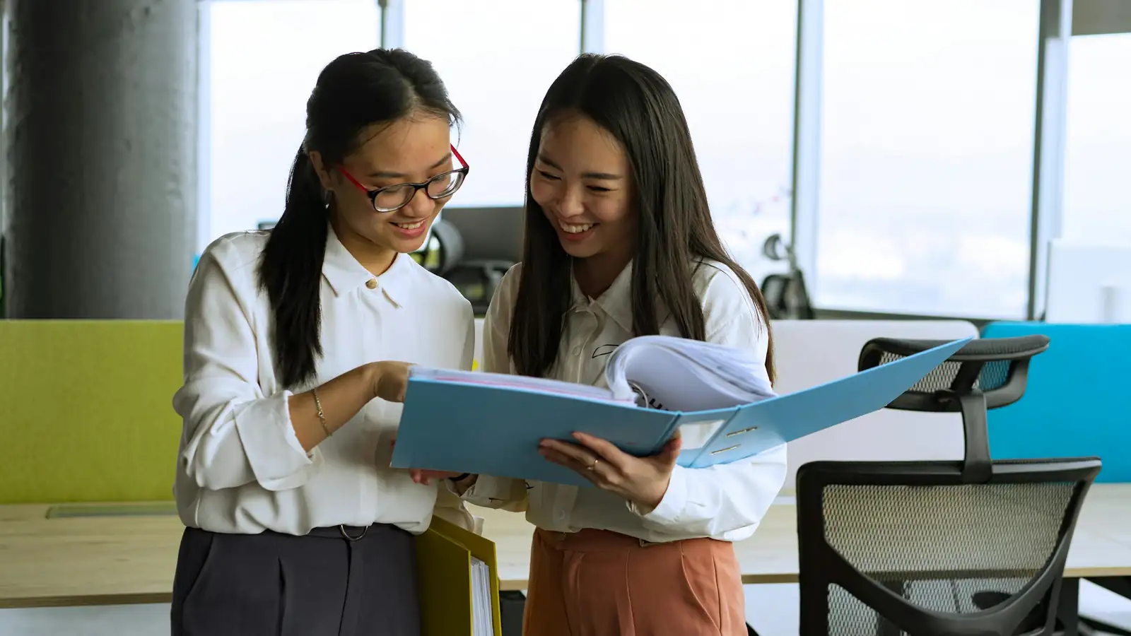 Professionals working in a clean office