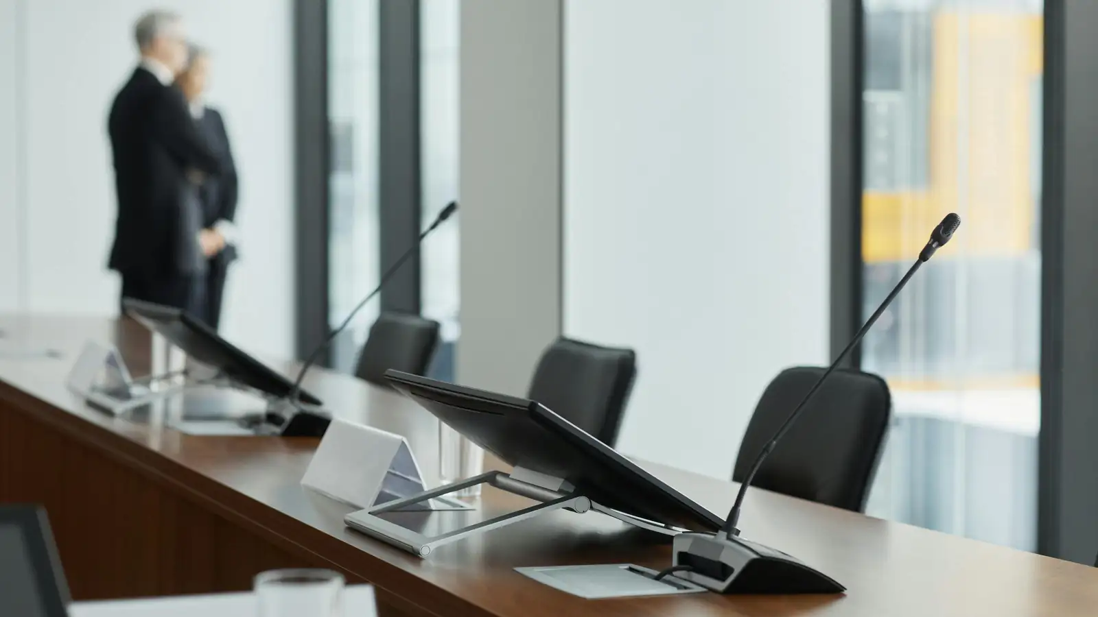 Executive in a spotless conference room